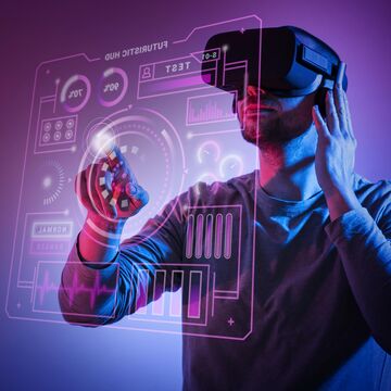 Person trägt VR-Brille in einem Raum mit pinker Beleuchtung