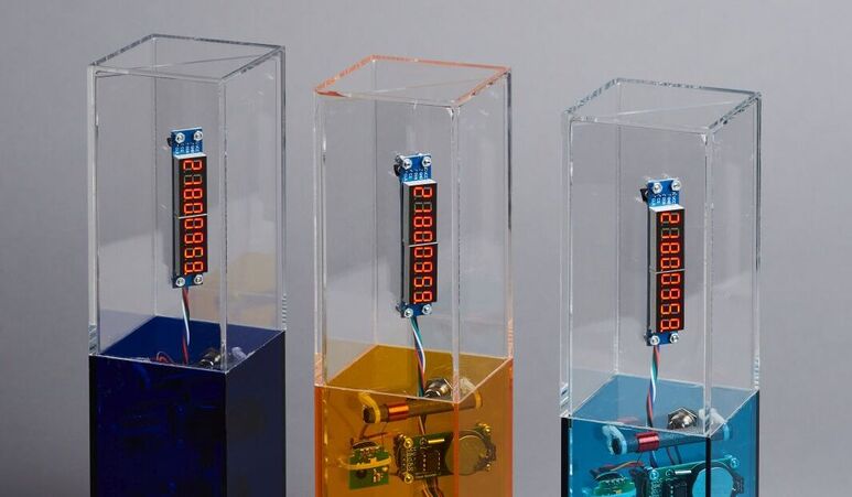 Drei Pokale Wettbewerb KI-Champions BW in Blau, in Orange und inTürkis
