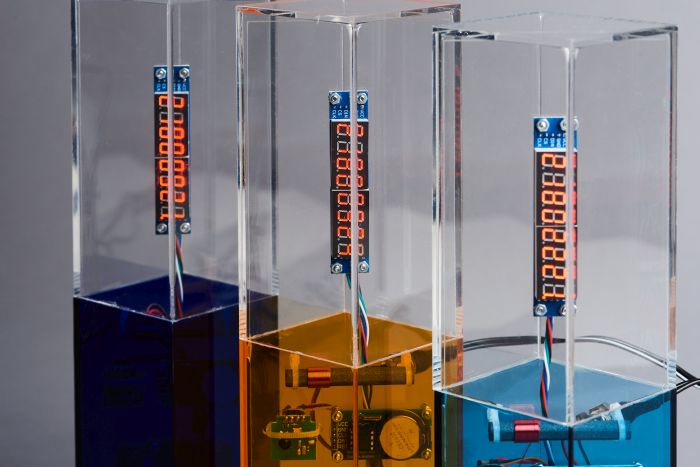 Drei Pokale Wettbewerb KI-Champions BW in Blau, Orange und Türkis